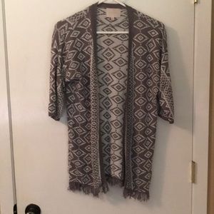 Open front cardigan style.